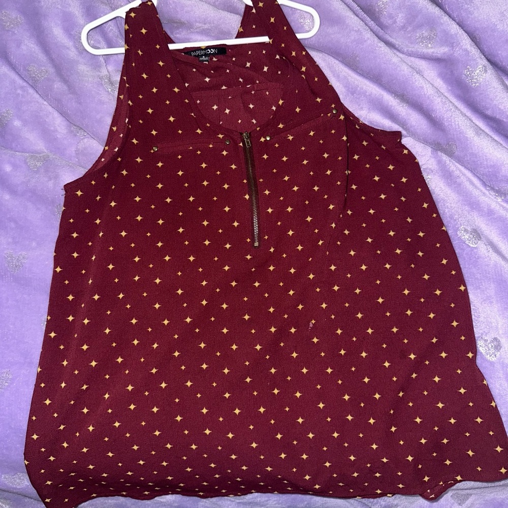 Maroon shirt with gold stars